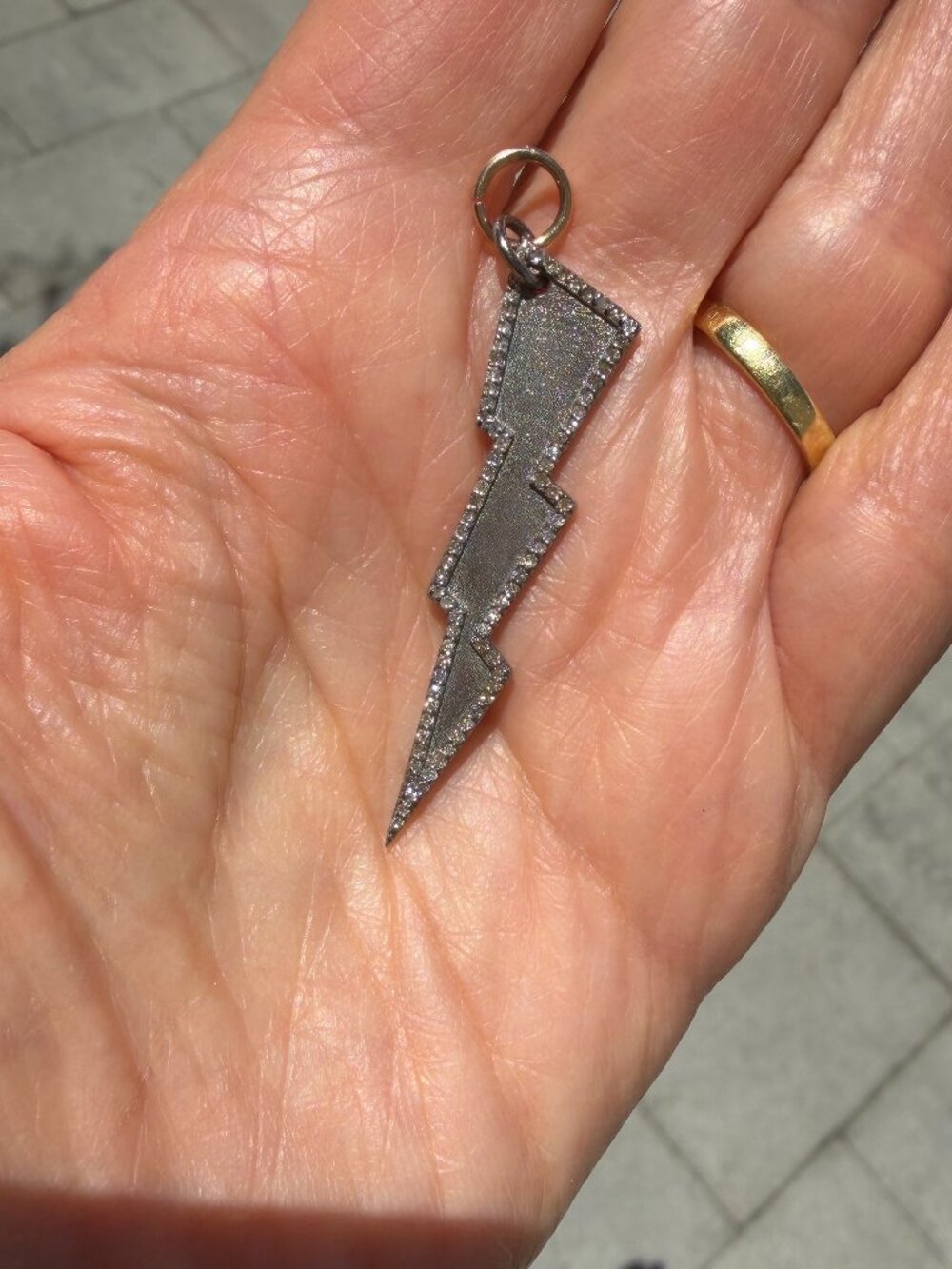 Sterling silver and pave diamond lightening bolt pendant from J. Landa Jewelry